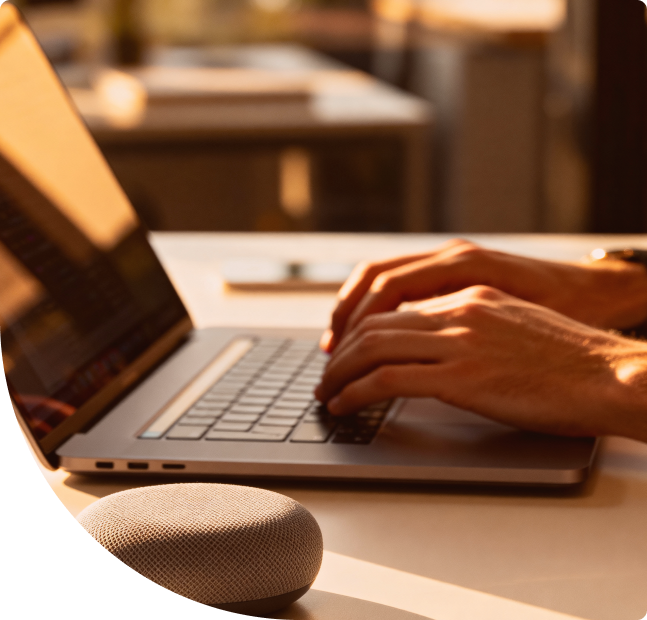 Laptop and hands at work